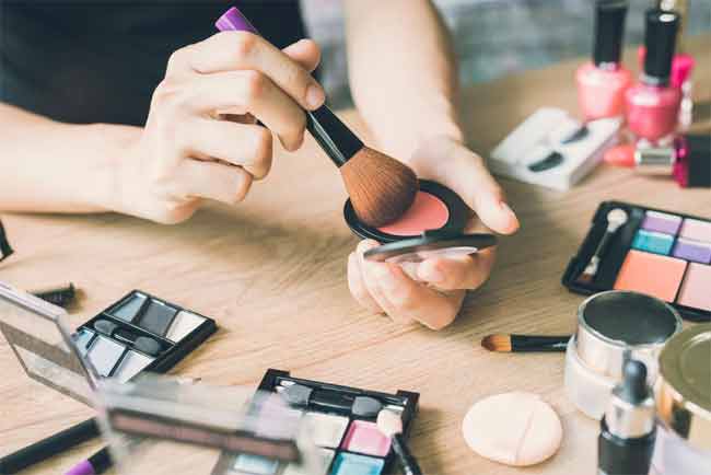 why do women wear makeup
